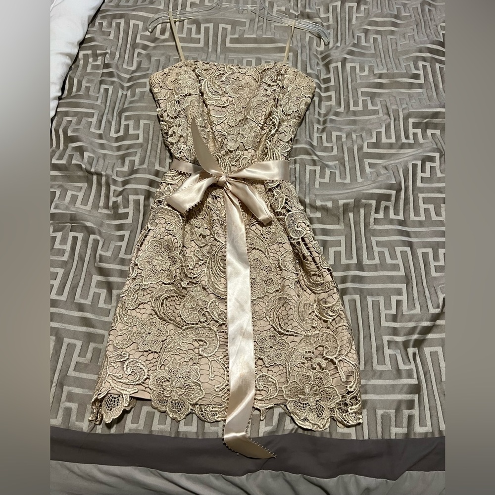 Women’s gold lace dress from Cachè